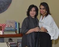 After winning the Cadillac Design Challenge, H.E Shaikha Mai receives Bahraini designer Hind Matar
